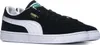 A pair of black Puma Suede sneakers with white accents and soles, shown from a side angle on a white background. Produktbild-Vorschau