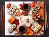 A festive autumn-themed arrangement of sushi, pumpkins, and fall foliage on a wooden surface. Náhled obrázku produktu
