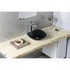 A modern bathroom vanity with a black stone vessel sink and a chrome faucet. Anteprima dell’immagine prodotto