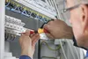 An electrician working on a fuse box. Náhľad obrázku produktu