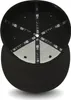 The underside of a black baseball cap is shown against a white background. Produktbild-Vorschau