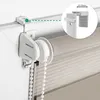 Close-up of a roller blind mechanism and fabric, with an inset showing a measurement detail. Produktbild-Vorschau
