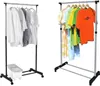 Two rolling garment racks are shown against a white background. One rack on the left holds white and striped shirts and has a small white storage bin underneath. The rack on the right displays a variety of colorful t-shirts. Anteprima dell’immagine prodotto