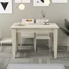 A dining table with chairs in a room. Anteprima dell’immagine prodotto