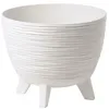 A white planter with a textured exterior and three legs, shown against a white background. Produktbild-Vorschau