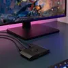 A gaming setup with a monitor and a capture card. Náhled obrázku produktu