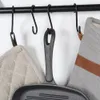 Close-up of kitchen items hanging on a rack. Náhľad obrázku produktu