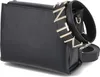 A black handbag with a gold logo strap is shown against a white background. Náhled obrázku produktu