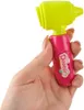 A hand holding a toy doctor's otoscope. Náhľad obrázku produktu