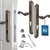 A set of door handles and related hardware, including screws and an Allen key, displayed against a white background. A "Made in EU" tag is attached to one of the handles. Produktbild-Vorschau