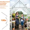 A woman and a girl are standing in a greenhouse, holding gardening tools and plants. Náhľad obrázku produktu
