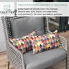Two decorative pillows on an outdoor chair. Produktbild-Vorschau