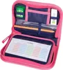 An open pencil case with various stationery items inside. Náhled obrázku produktu