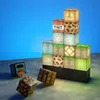 A collection of Minecraft-themed building blocks arranged in a pyramid shape, with a few blocks scattered in the foreground. Náhľad obrázku produktu