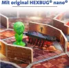A toy game board with a green figurine and a toy bug. Podgląd zdjęcia produktu