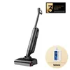 A black and gray wet and dry vacuum cleaner is shown on a white background, with a bottle of cleaning fluid and a warranty badge in the corner. Voir les images du produit
