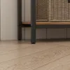 Close-up of the legs and bottom shelf of a bookshelf. Produktbild-Vorschau