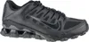 A black Nike Reax 8 Tr Mesh sneaker is shown from the side against a white background. Produktbild-Vorschau