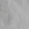 A close-up, textured view of a white woven tarp. Podgląd zdjęcia produktu