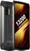A rugged smartphone is shown from two angles, with a close-up of its rear camera array and a view of its screen displaying battery information. Podgląd zdjęcia produktu