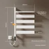 A diagram showing the dimensions and features of a white electric towel rail mounted on a gray wall. Anteprima dell’immagine prodotto