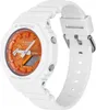 A white G-Shock watch with an orange face is shown from a side angle against a white background. Anteprima dell’immagine prodotto