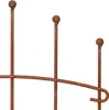 A close-up view of a rusted metal garden border fence with decorative balls on top. Produktbild-Vorschau