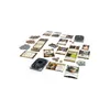 A collection of cards and tokens laid out on a white surface, likely for a board game. Anteprima dell’immagine prodotto