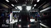 A racing pit crew in a garage. Produktbild-Vorschau