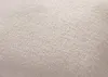 A close-up view of a textured fabric, likely a cushion or upholstery. Produktbild-Vorschau