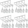 Four silver wine glass racks mounted on a white background, each holding multiple wine glasses. Náhled obrázku produktu