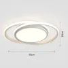 A modern, circular LED ceiling light with two overlapping rings, shown against a white background with size indicators. Produktbild-Vorschau