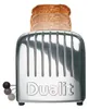 A chrome Dualit toaster with three slices of toast in it, set against a white background. Anteprima dell’immagine prodotto
