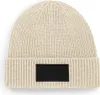 A single beanie is shown against a white background. Anteprima dell’immagine prodotto
