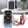A thermoelectric cooling module with fans and wires is shown in the foreground, with a mini air conditioner on a table in the background. Podgląd zdjęcia produktu