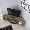 A corner TV stand with a television on top, a soundbar, and a media player below, in a room setting. Produktbild-Vorschau