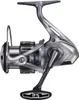 A studio shot of a fishing reel against a white background. Produktbild-Vorschau