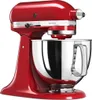A red KitchenAid stand mixer is shown in profile against a white background. Náhled obrázku produktu