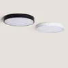 Two ceiling lights, one black and one white, are shown against a light gray background. Produktbild-Vorschau