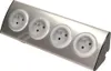 A silver power strip with four outlets, shown against a white background. Náhled obrázku produktu