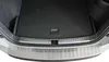 The image shows the rear bumper and trunk area of a car, fitted with a silver metal protector strip. Produktbild-Vorschau