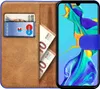 A book-style phone case open to reveal card slots and cash, with a smartphone inside. Anteprima dell’immagine prodotto