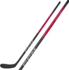 Two hockey sticks are shown diagonally against a white background. Voir les images du produit