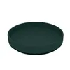 A dark green silicone plate with a suction base, shown from a slightly elevated side angle on a white background. Náhľad obrázku produktu