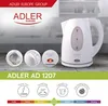 A white electric kettle is shown with several close-up detail shots and feature icons below. Voir les images du produit