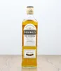 A bottle of Bushmills Original Irish Whiskey on a wooden surface. Produktbild-Vorschau