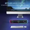 A computer monitor, speakers, keyboard, and mouse are displayed on a dark blue surface, with text overlays highlighting the product's features. Produktbild-Vorschau