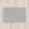 A top-down view of a gray shower tray on a light wood floor. Produktbild-Vorschau