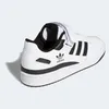 A white Adidas basketball shoe with black accents is shown from the side and back. Produktbild-Vorschau