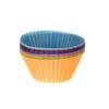A stack of colorful silicone muffin liners on a white background. Voir les images du produit